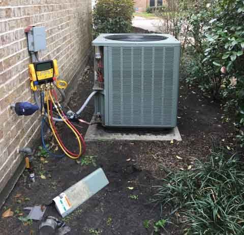 Air conditioning unit during Spring TX ac repair service job.