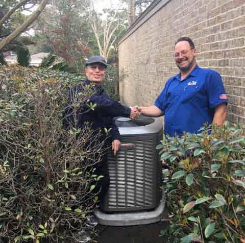 Handshake after maintain your air conditioner consultation.