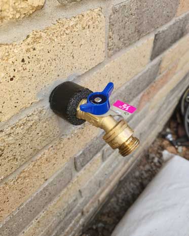 Tomball plumbing services job complete with new outsite faucet.